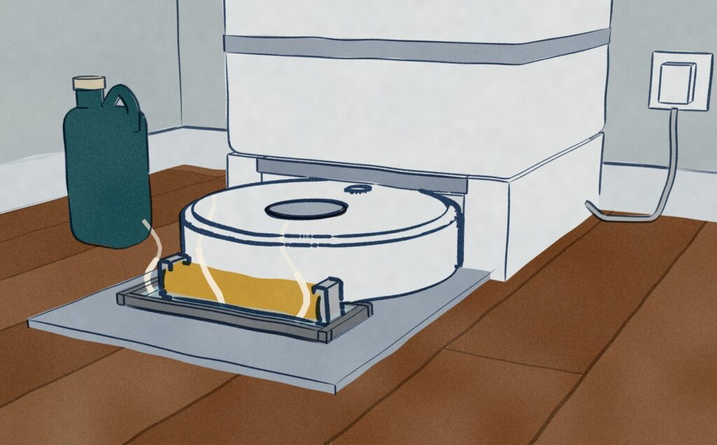 Close at floor level in a utility corner, the white MOVA S70 Roller sits nosed into its white wash tower, its roller mop under its rear edge in a tray of hot water let into the ramp, thin steam rising.