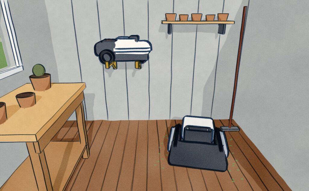 Inside a garden shed, the light white Husqvarna mower hangs on a wall bracket while the heavy black tracked Lymow stands on the floorboards below it.
