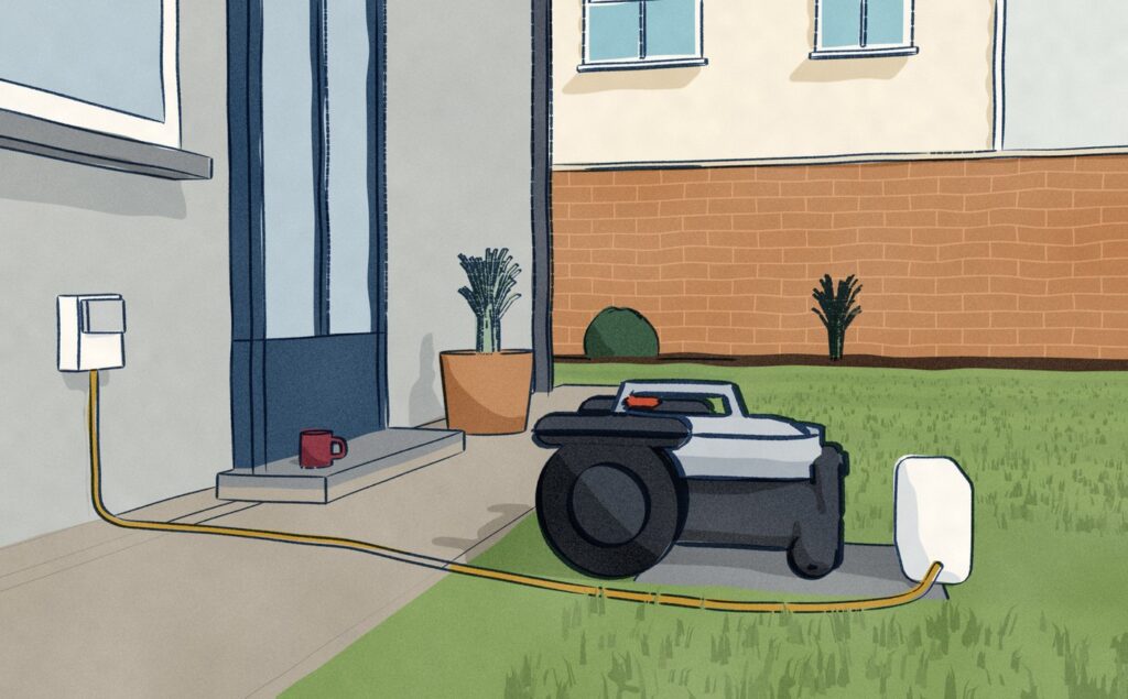 Early in the morning the eufy E15 robot mower waits on its charging station on the lawn by the back door, its lead running back over the pavers to the outdoor socket, a mug of coffee left on the step.