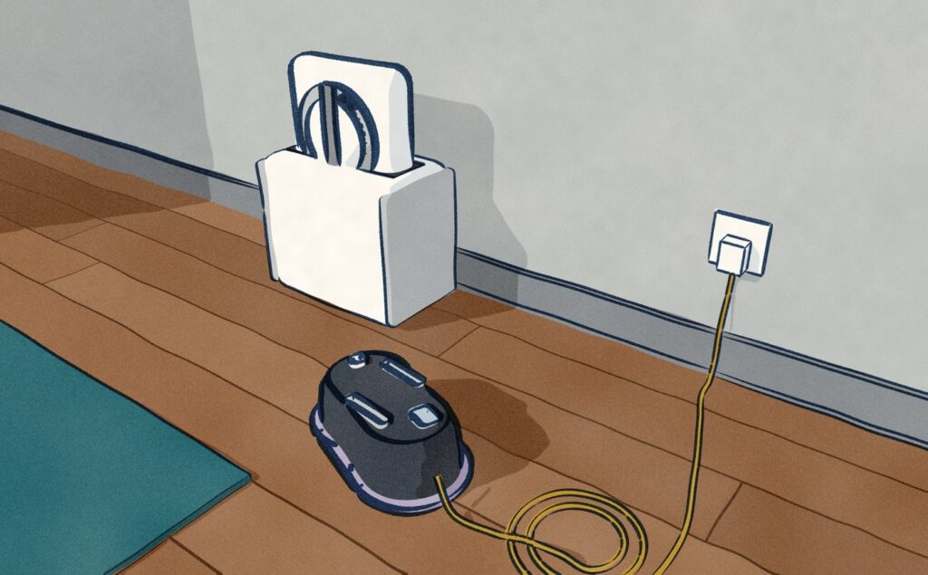 On the floor under the window, a Winbot W2 Pro Omni stands docked in its white station while a HOBOT 388 lies pad-down on the boards beside it, its mains cord in a loose coil and running on to a wall socket.