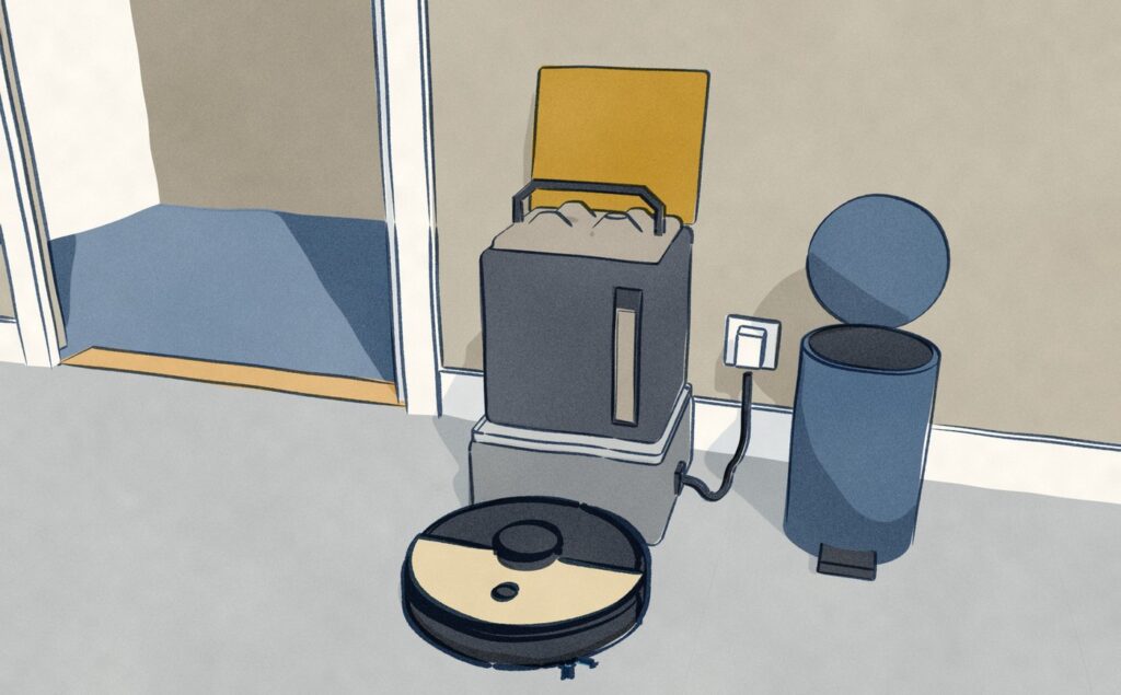 In a hall, the Shark AI Ultra sits docked at its tall black bagless base, whose gold lid stands open over a bin full of loose dirt, with an open pedal bin beside it ready to take it: there is no bag.