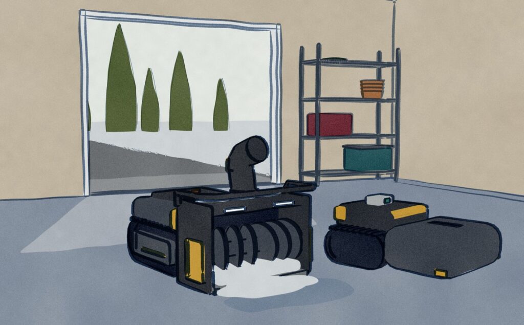 Inside the garage at floor level: a Yarbo M20i waits in its mower shell with no snow tool on it, and beside it a Yarbo Y40, back in from the snowed drive, stands with a lump of snow at its auger and more spilled on the floor.