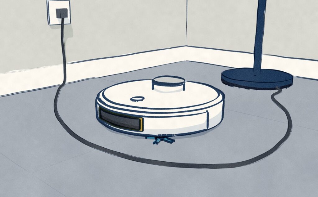 In a corner of the sunken room, the white Dreame L60 Ultra PE has stopped a hand's width short of a floor lamp's lead that curves across the tiles from the wall socket to the lamp, its dark front sensor window facing the cable.